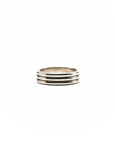 A silver-toned multi-band ring with five parallel horizontal bands, photographed on a seamless white background.