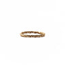 A thin twisted rope-style ring in a warm gold tone, photographed against a plain white background.