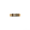 A stack of three slim gold rings centered on a plain white background.