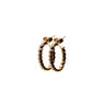 A pair of textured gold hoop earrings with a ribbed, snake-like pattern, shown on a plain white background.